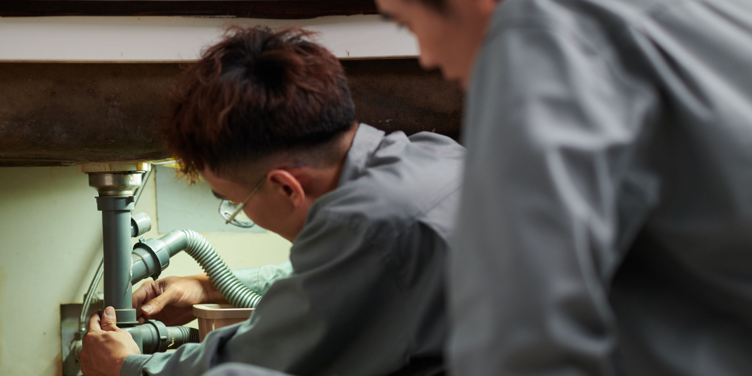 An apprentice engaged in work based learning