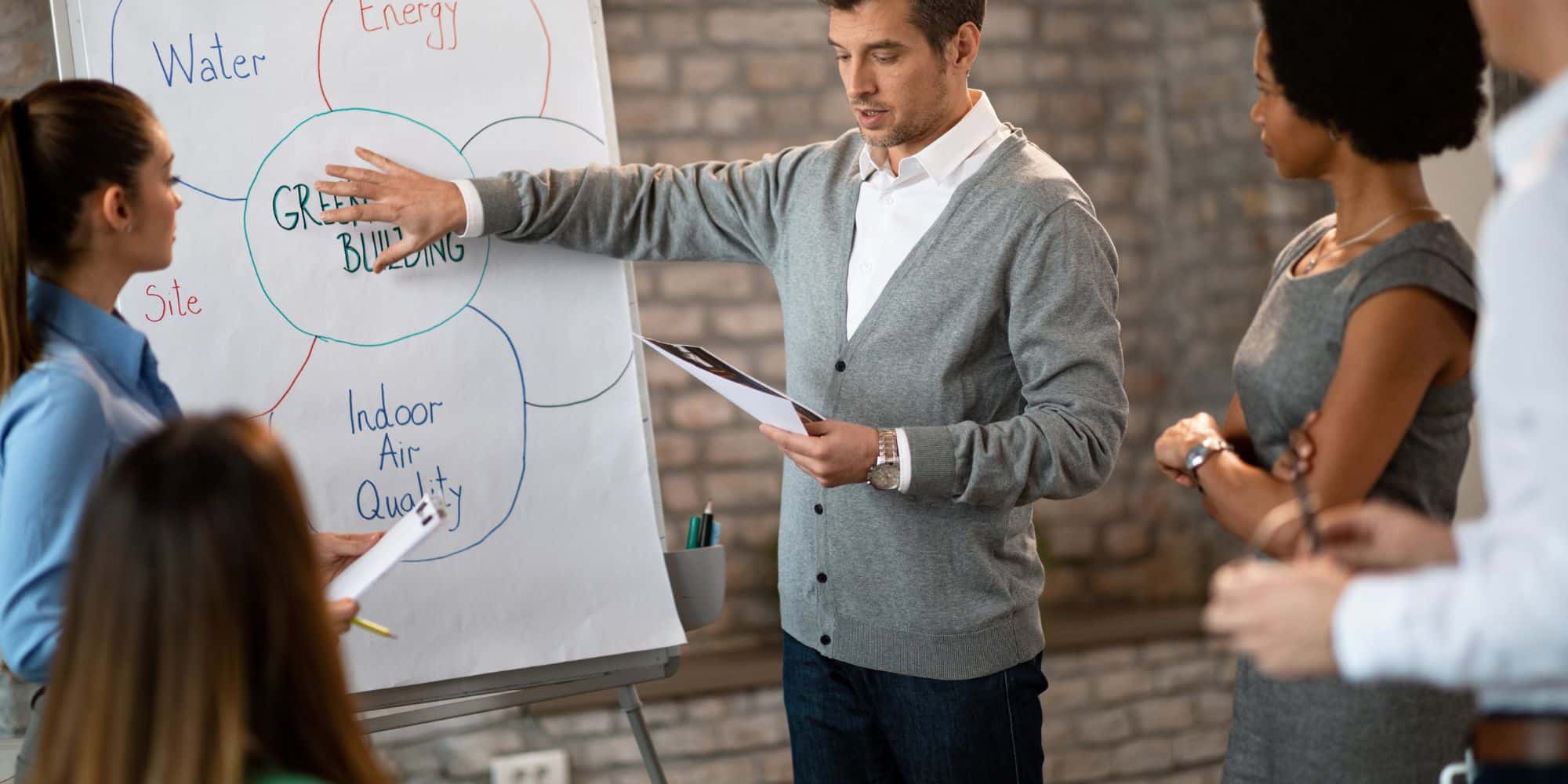 CEO discusses training objectives with staff