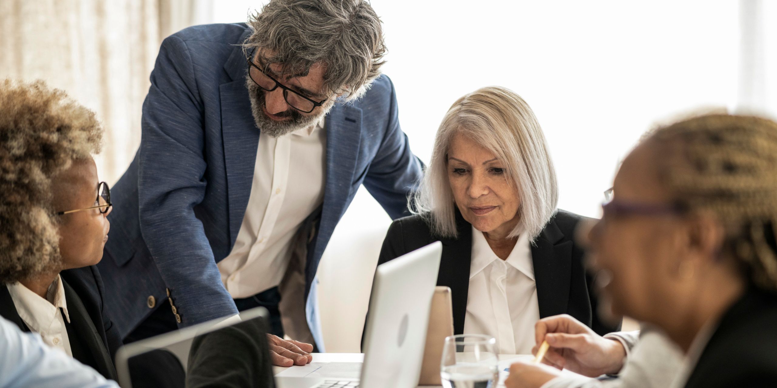 An example of a compliance team working on compliance management tasks
