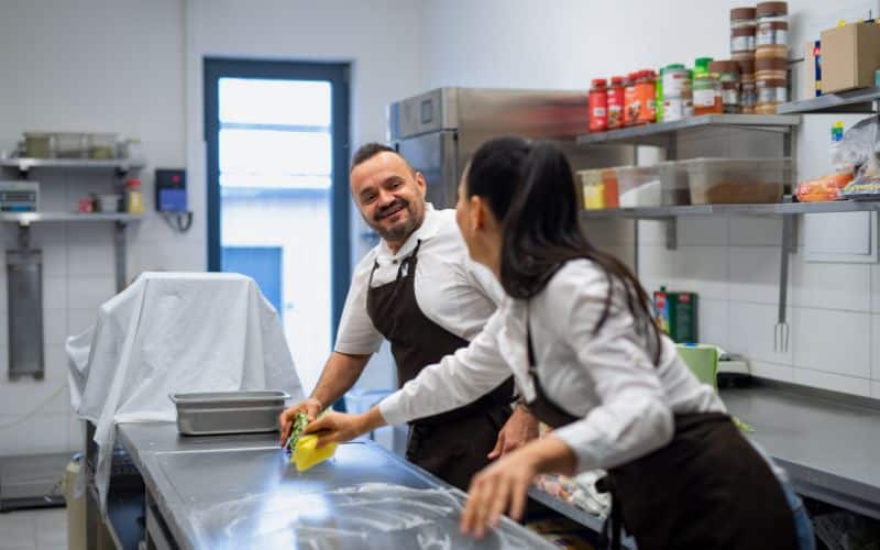 Cooks maintaining good housekeeping for ward or unit based food preparation and distribution services