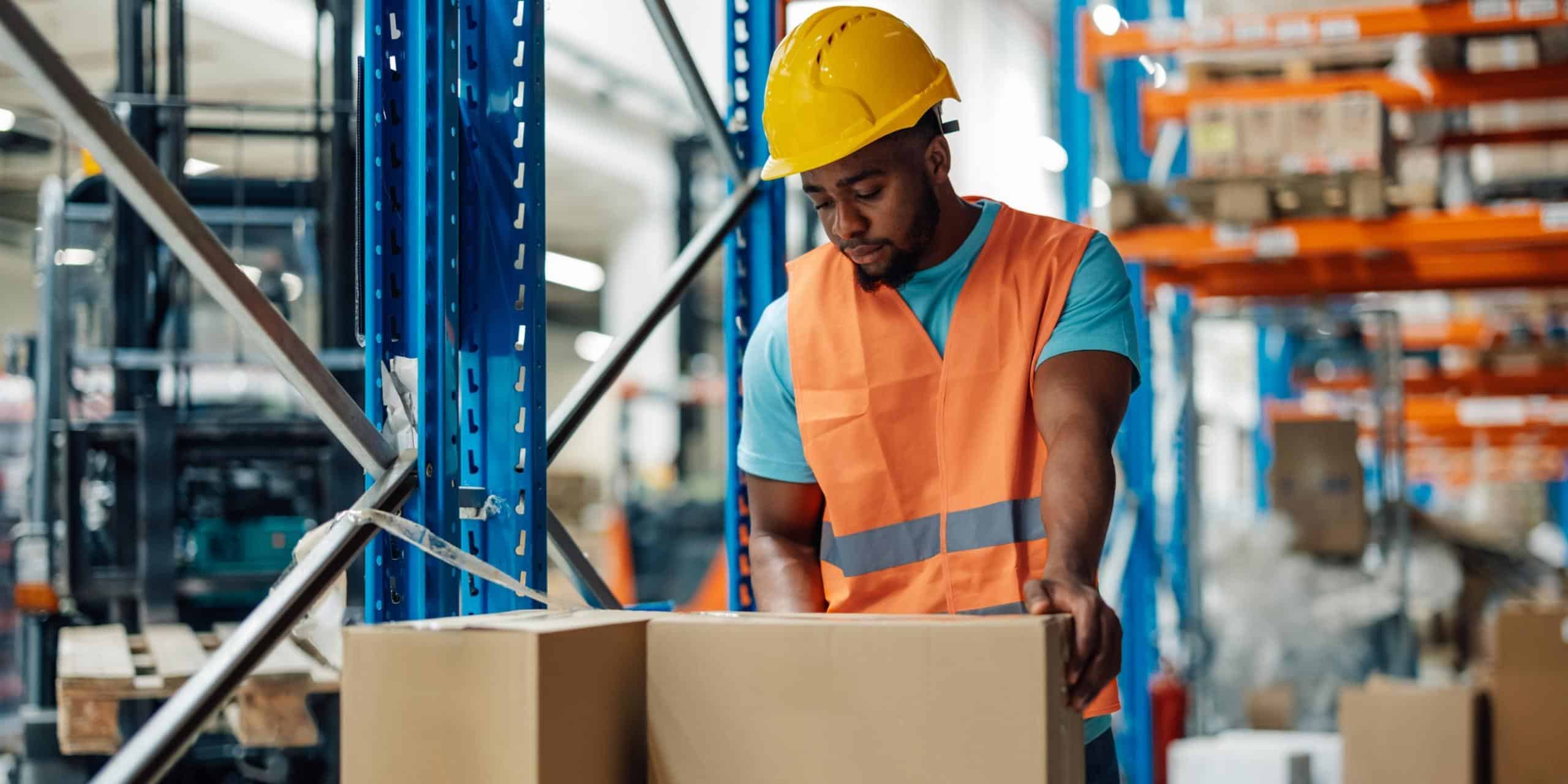 Employee-Manually-Handling-Heavy-Boxes