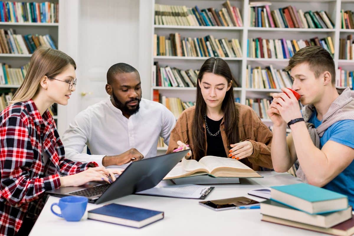 Employees Engaged in a Group Discussion for Better Knowledge Retention