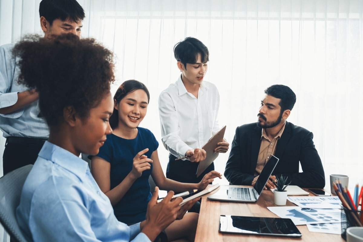 Employees Engaged in a Kolbs Learning Exercise