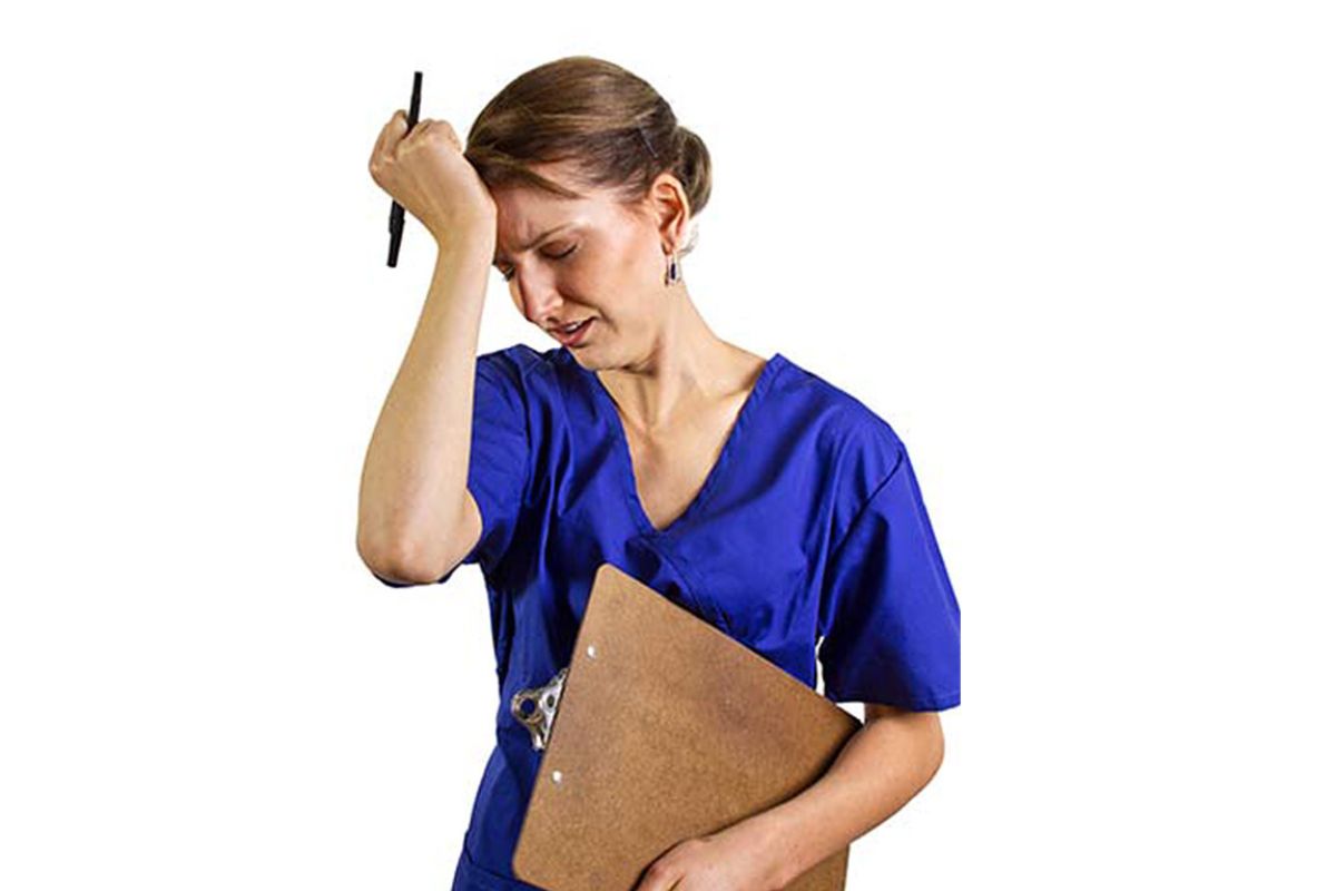 a support worker looking distressed