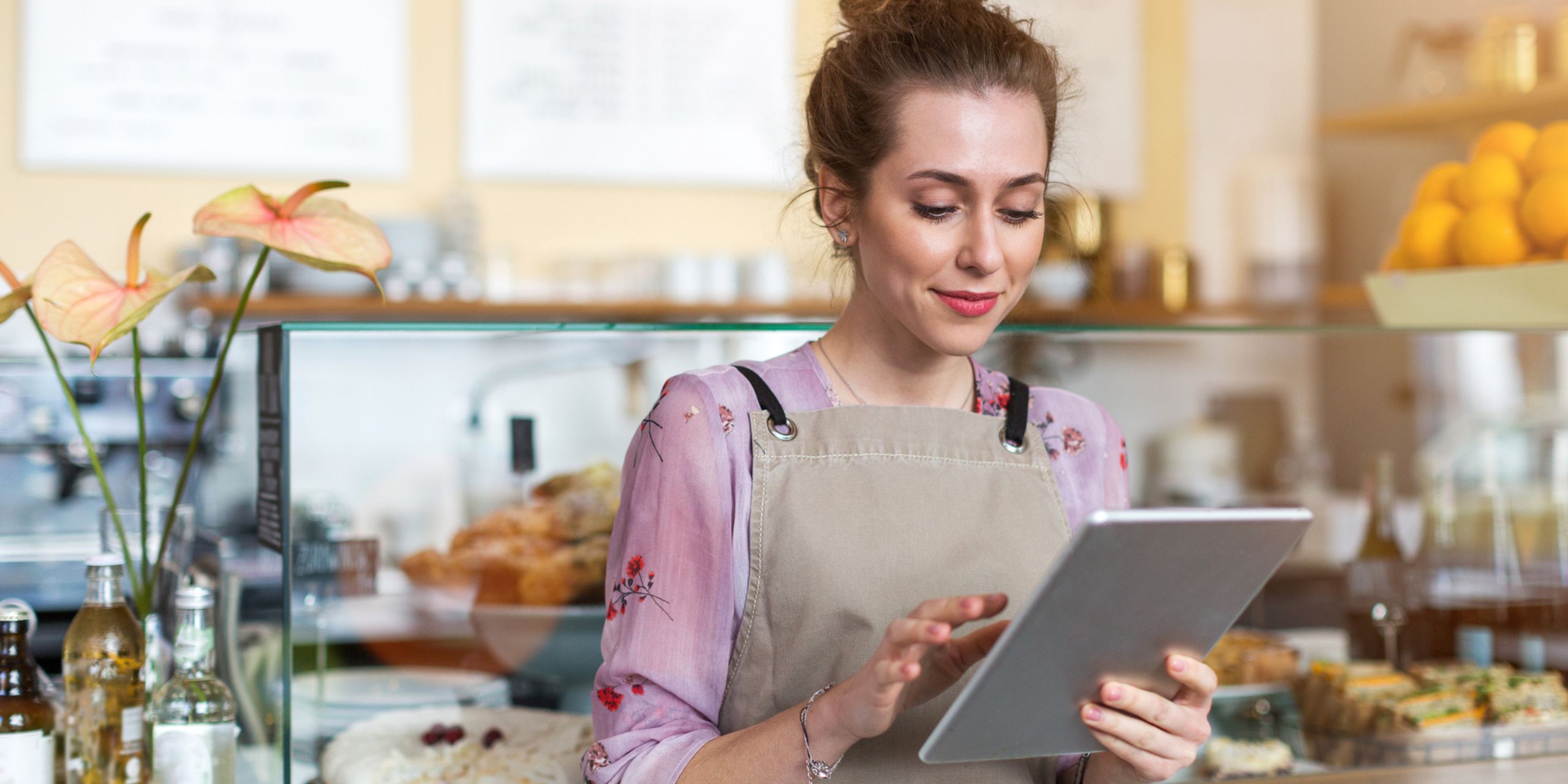 frontline employee engaged in mobile learning while at work