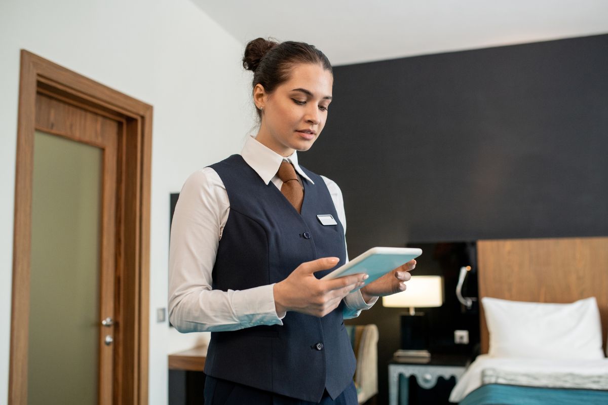 hospitality employee looking at a skills based training video