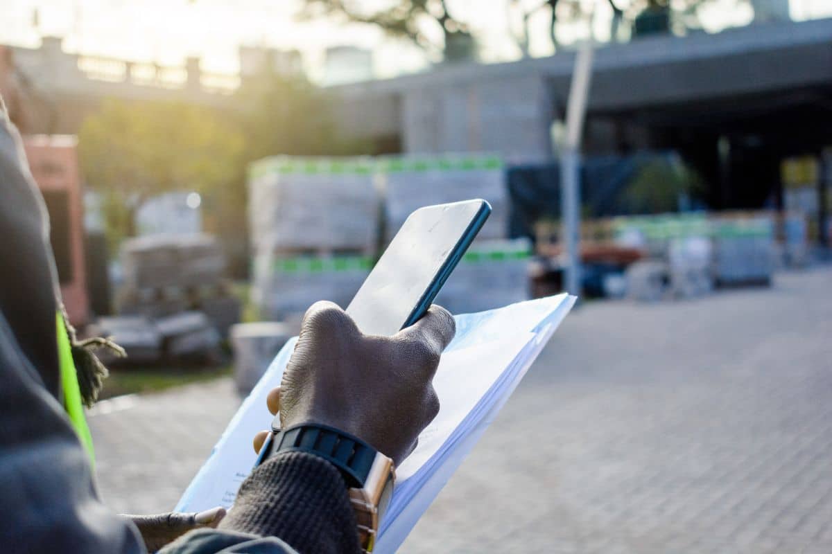 Man uses a cloud-based LMS on-site to learn.