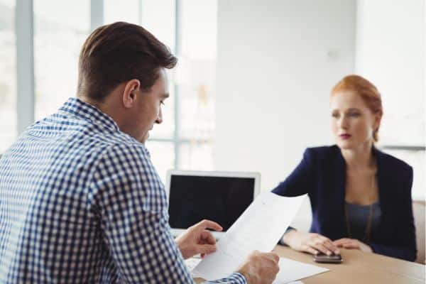 Manager discussing performance review with an employee