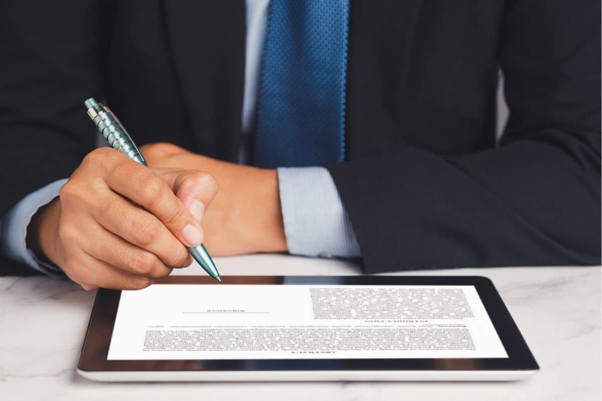New-Employee-Signing-a-Document
