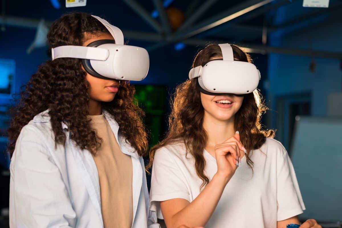 Young workers use VR glasses with cloud based LMS