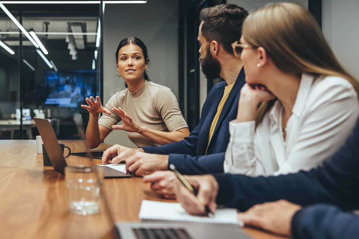 business woman clearly communicates ideas to colleagues