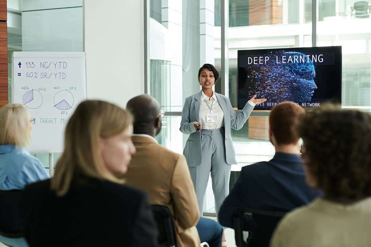 business woman conducts training on deep learning in ai