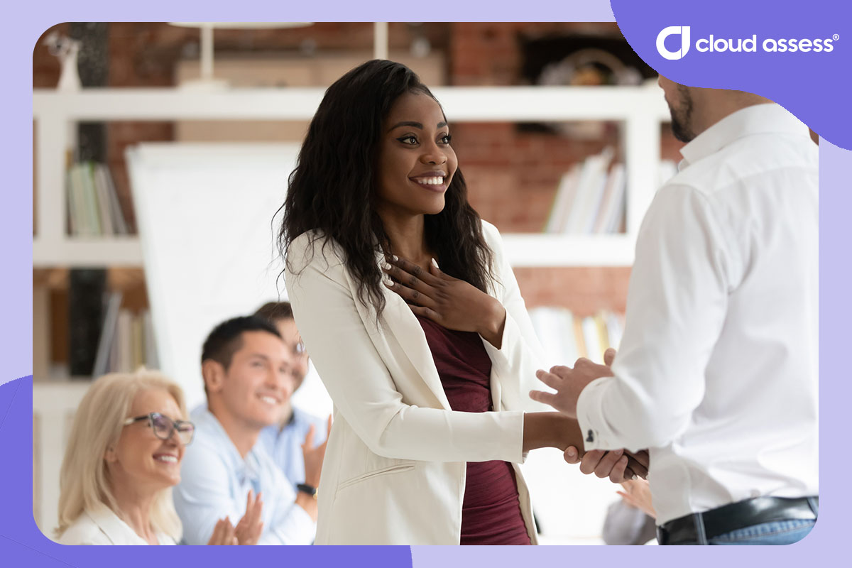 business woman is promoted during meeting