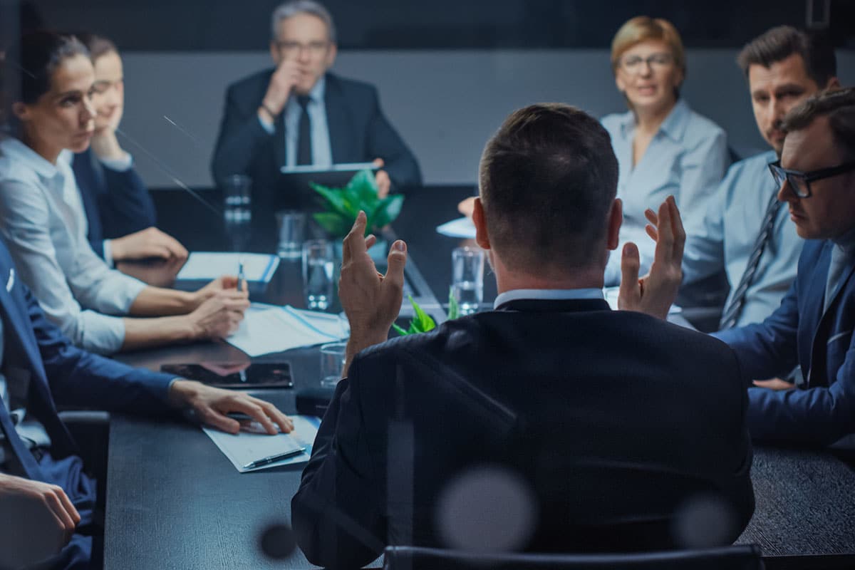 high level businessman dictates approach to employees in competing conflict management style