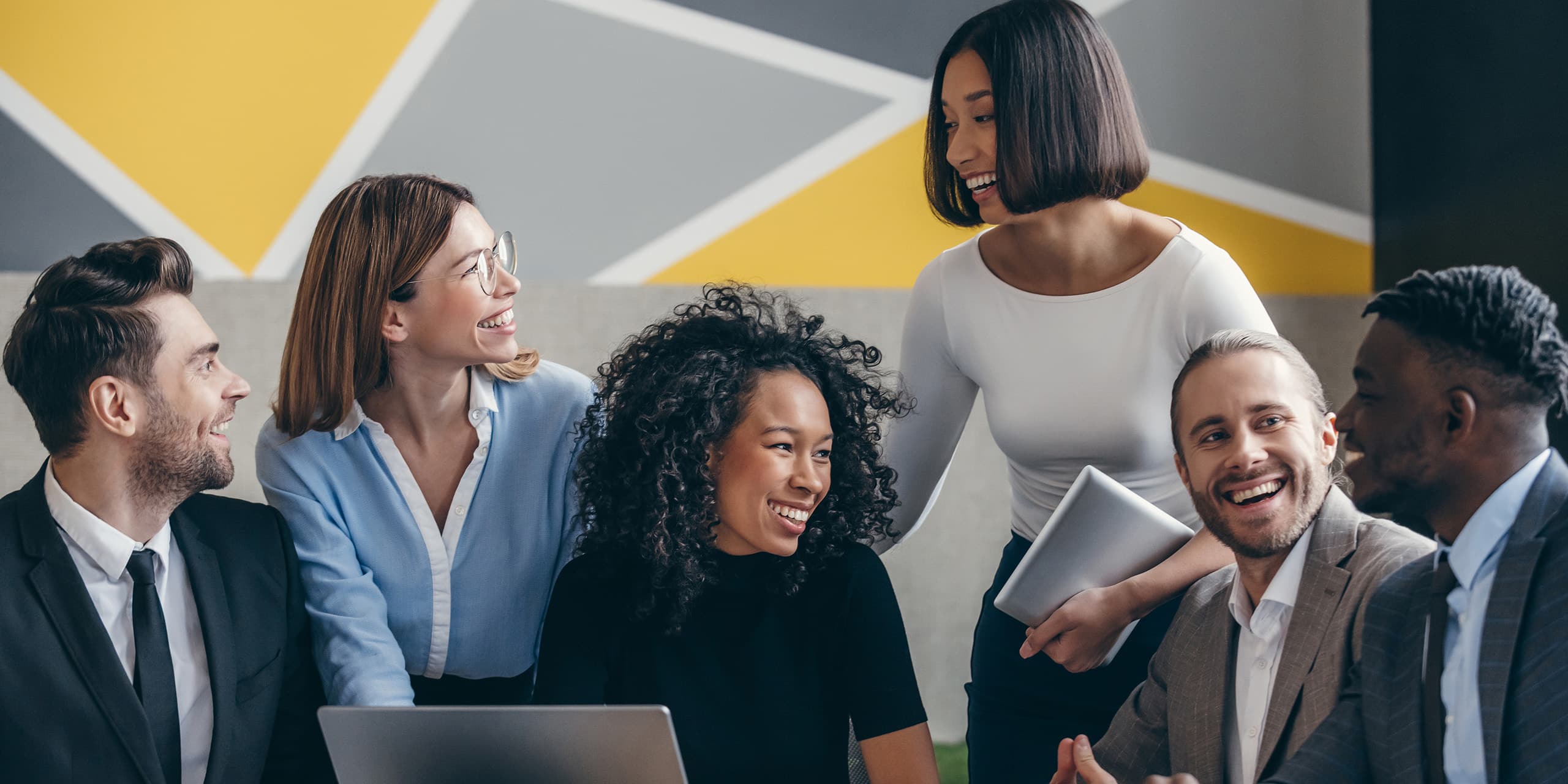 diverse team works together happily