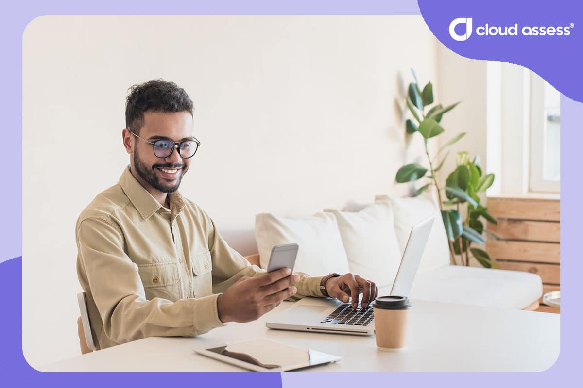 man accesses microlearning course on cellphone while working