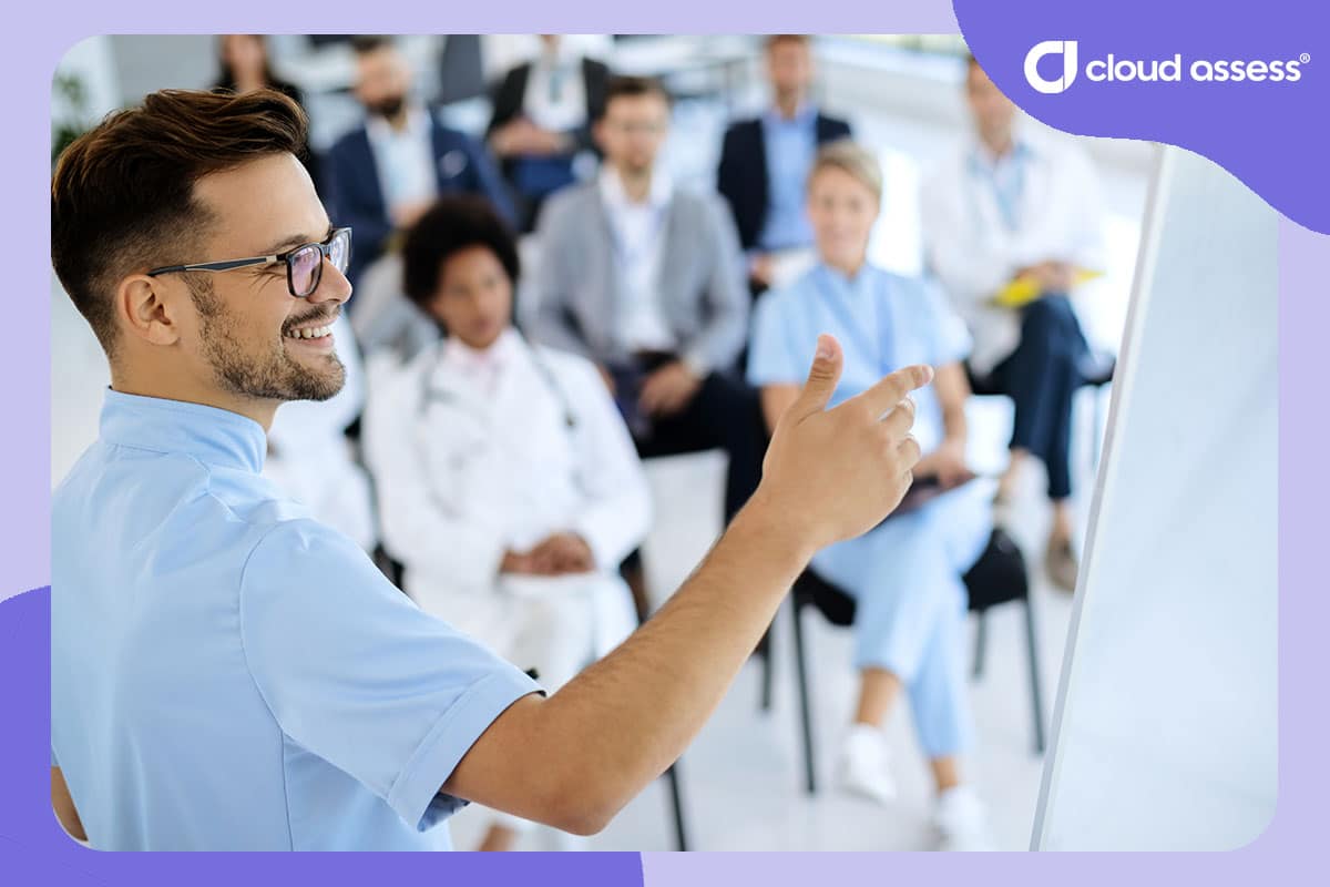 man gives lecture to medical professionals at private training establishment