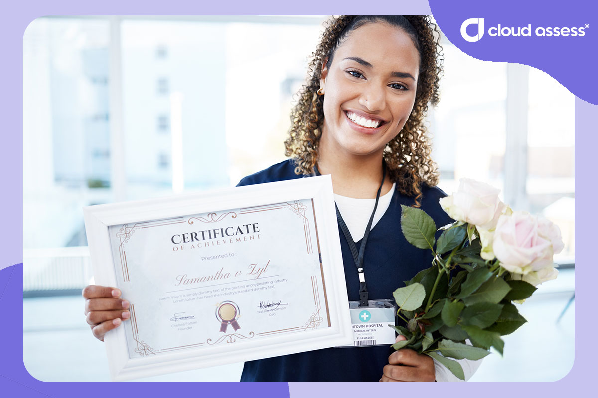nurse holds up certificate of achievement