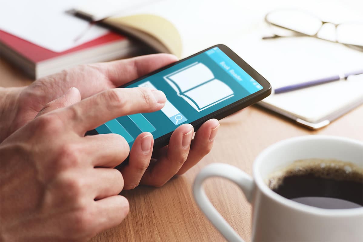 person accesses learning materials on smart phone