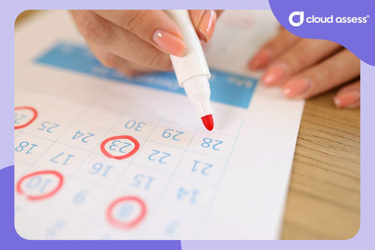 person circles dates on calendar to highlight training streaks