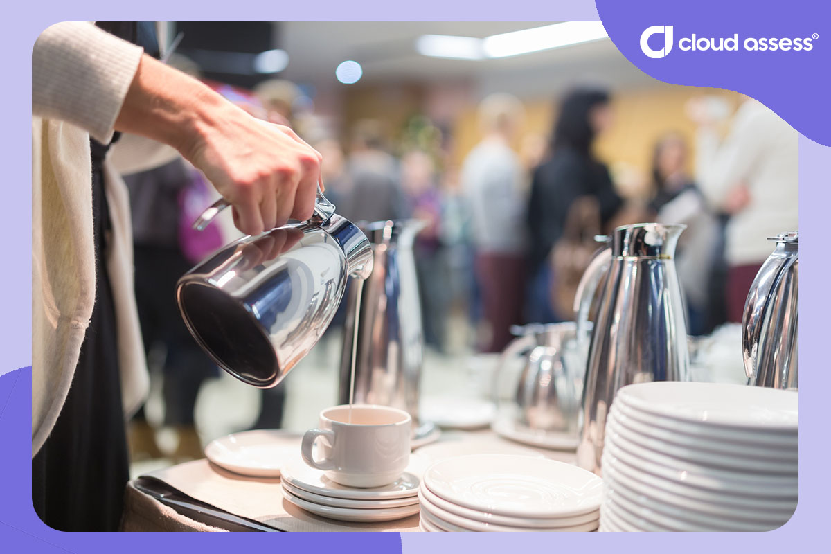student uses coffee station before exam