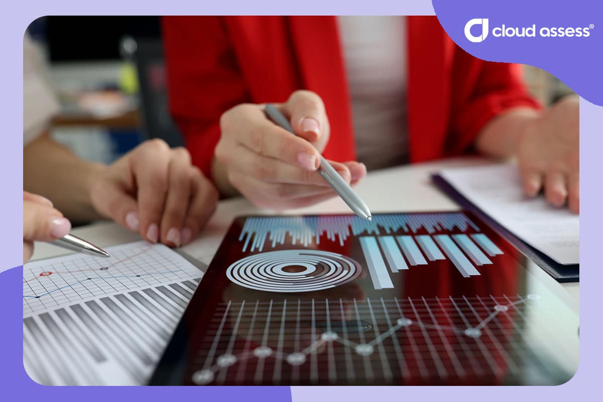 team reviews training metrics on paper and tablet