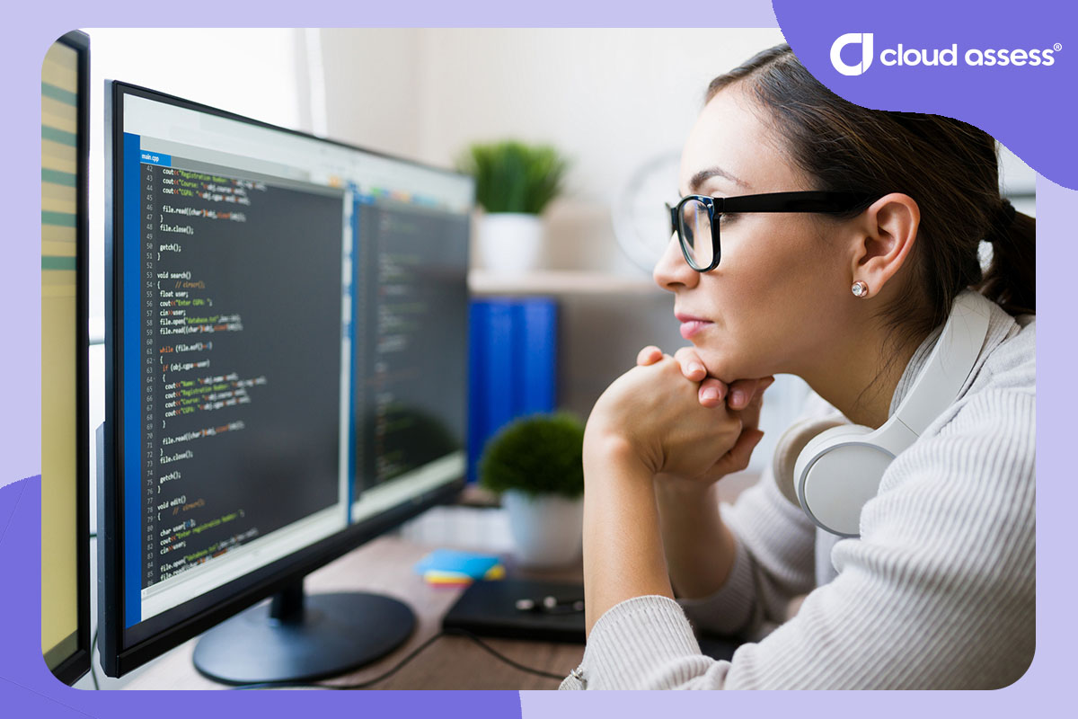 woman looking over code as example of hard skill