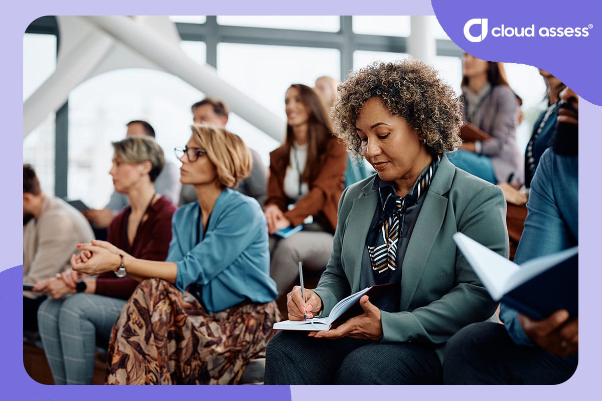 woman takes notes during business training