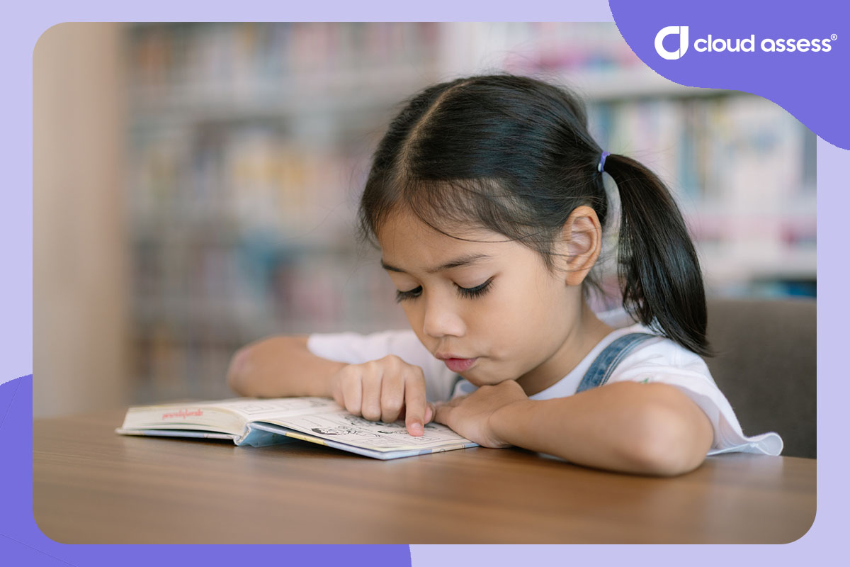 young girl reads book by herself as part of self directed learning
