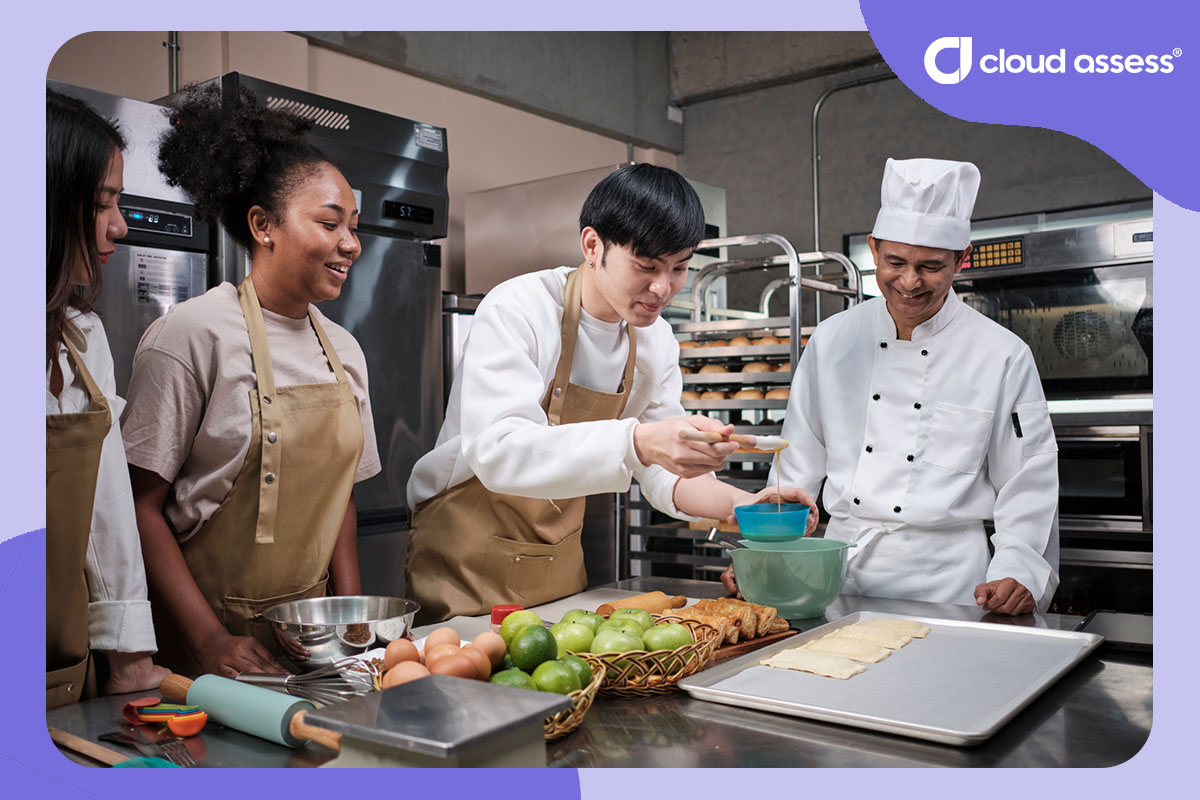 young trainee chefs learn how to work in the kitchen during vocational training
