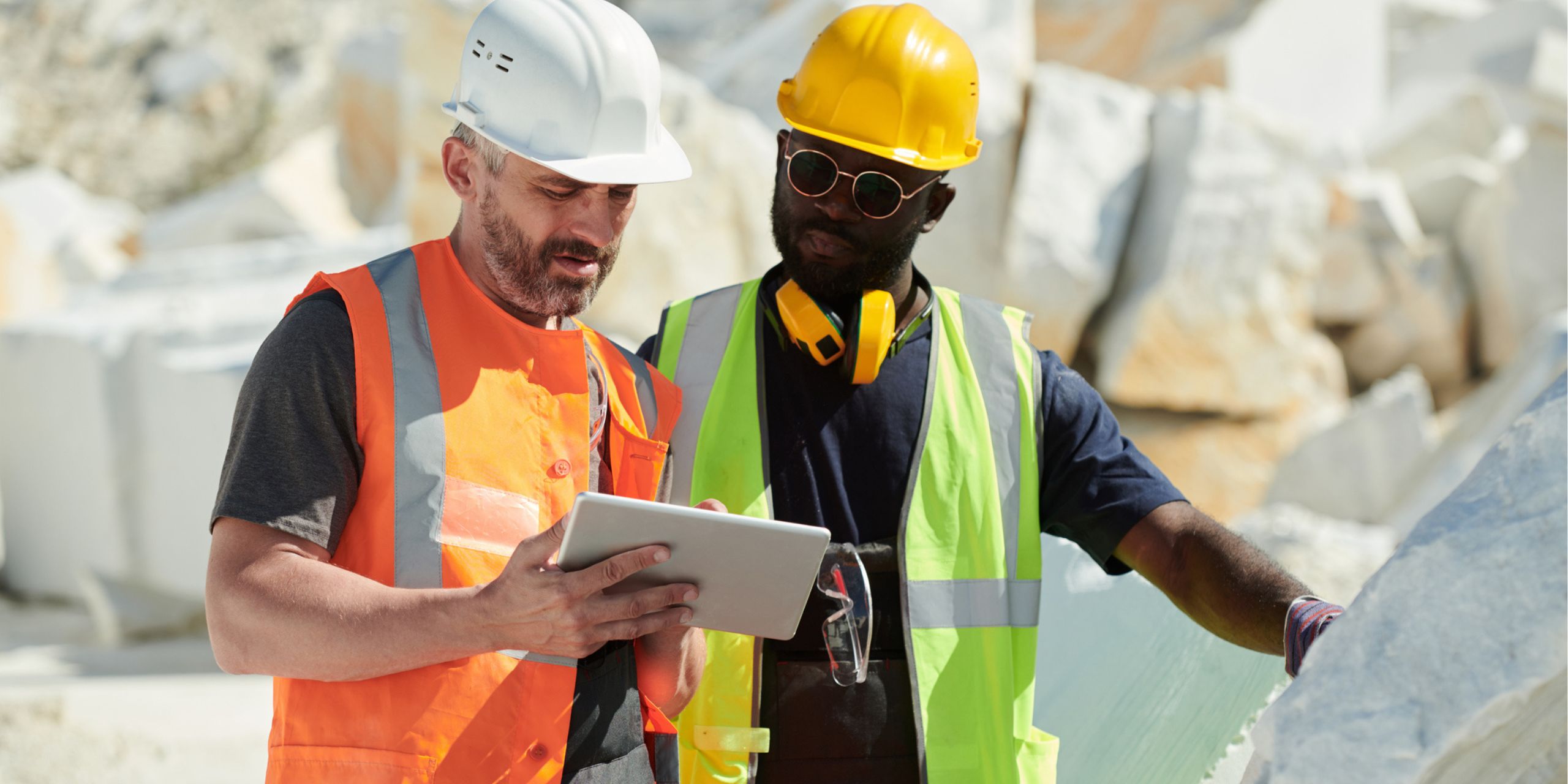 an example of mining workers using a mining lms on the field