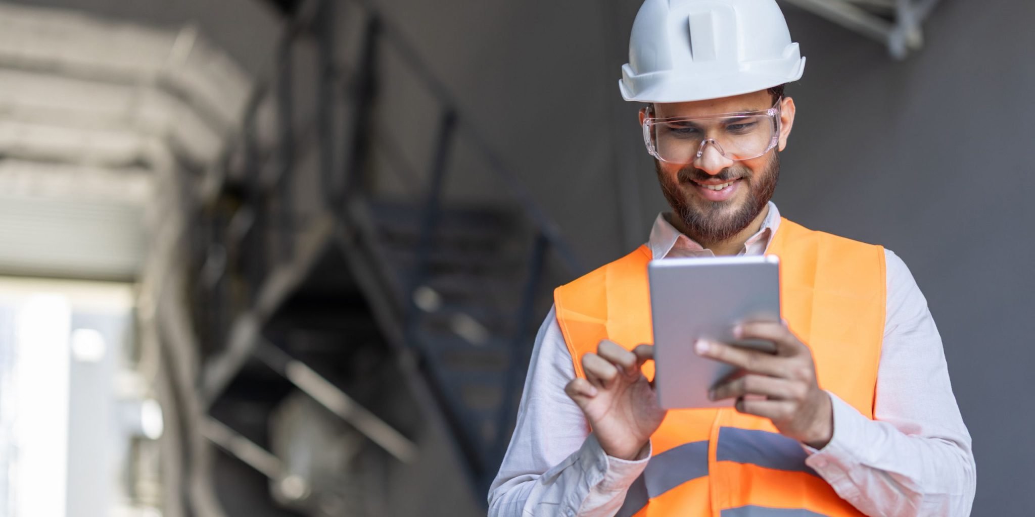 an example of a construction worker using a construction training management software