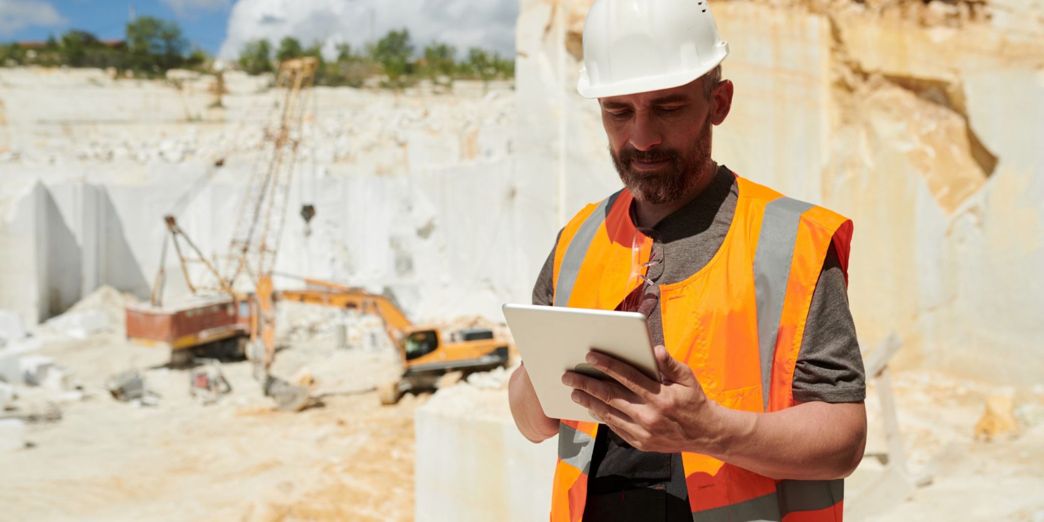 An example of a mining employee entering VOC data on a tablet